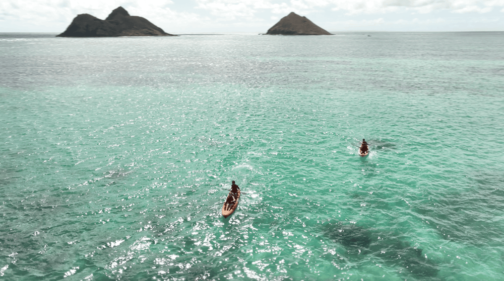 Two tandem kayak rentals from Active Oahu heading to the Mokulua Islands